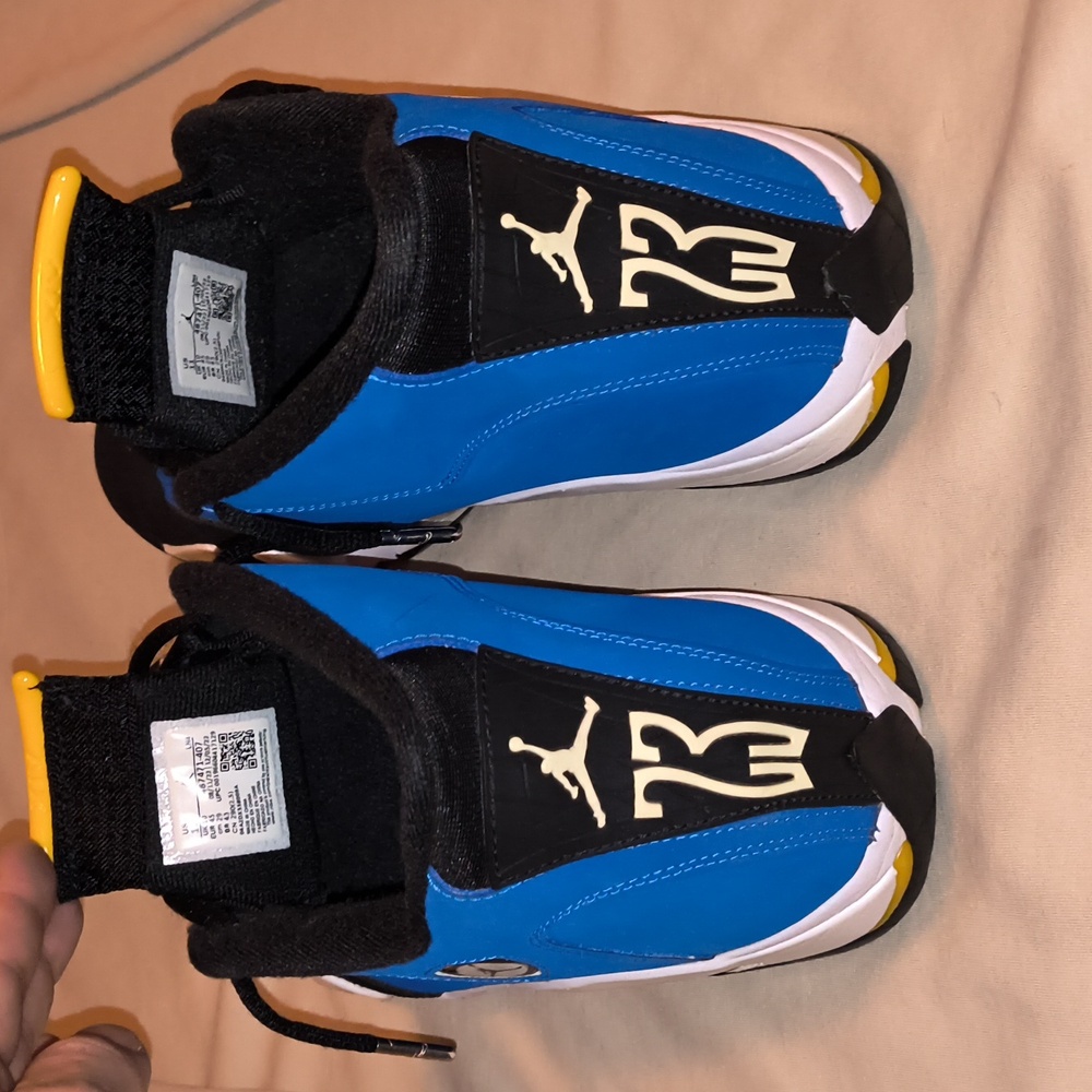 Jordan size 11. Blue, black, yellow, sparkle white.